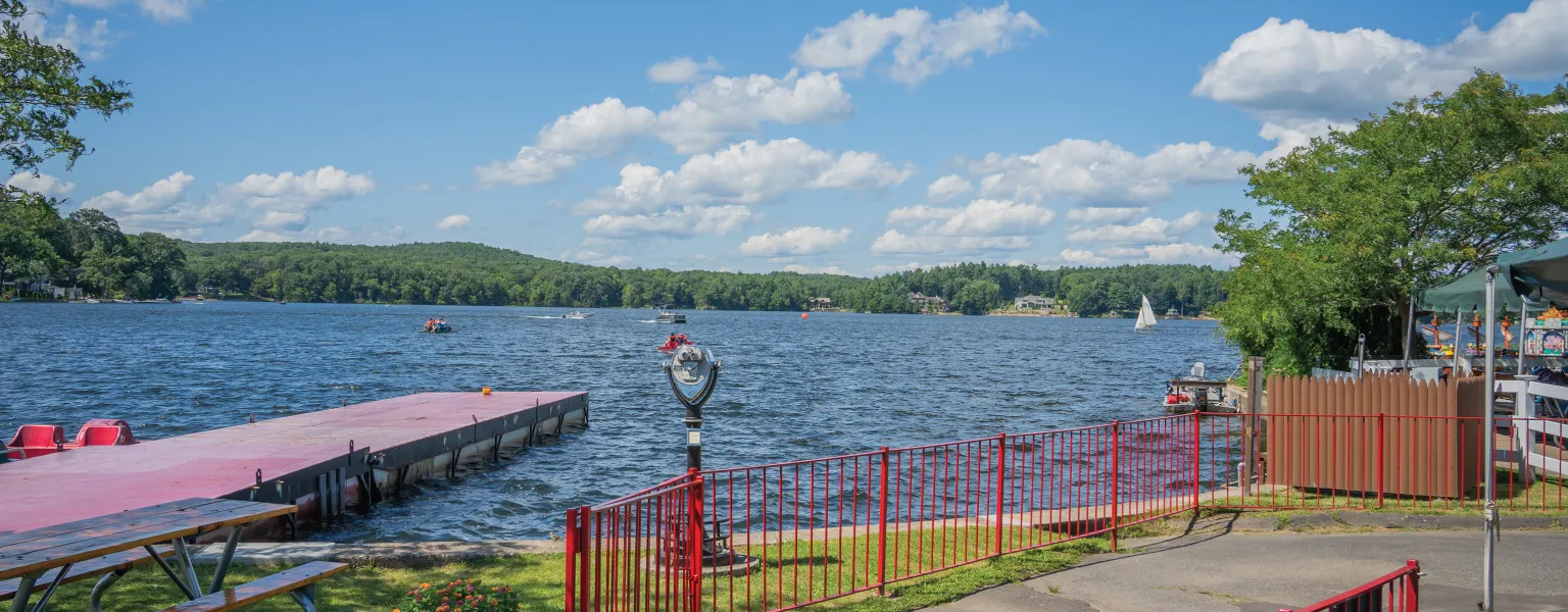 People sitting in Quassy Queen boat in the middle of Lake Quassapaug
