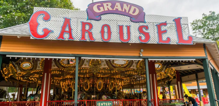 Shot of Grand Carousel ride from the outside, showing sign