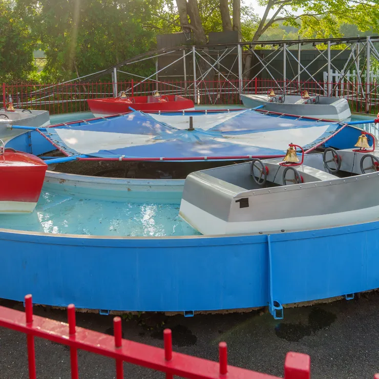 Shot of Kiddie Boat Ride with no children 