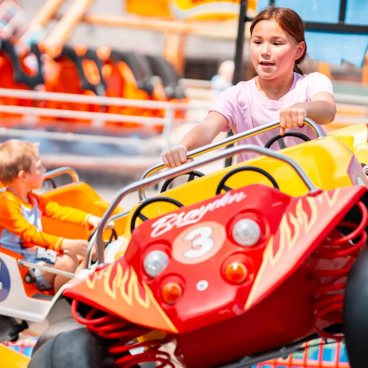 Girl in car on Bouncing Buggies ride